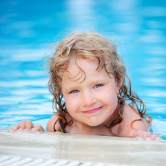 Fototapeta na wymiar Child in pool