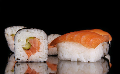 sushi rolls isolated on black
