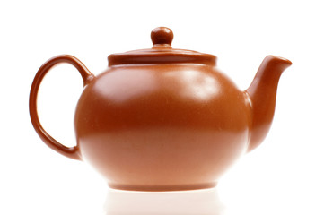brown ceramic teapot