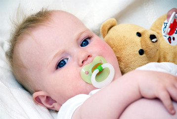 Baby with teddy