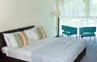 Room interior with double bed