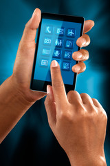 A woman use a mobile phone to search a application