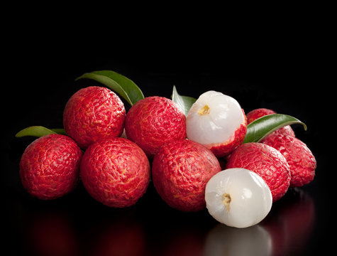 Lytchi fruit on a black background