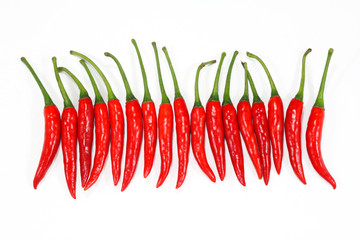 Stock Photo: Red chili peppers on a white background