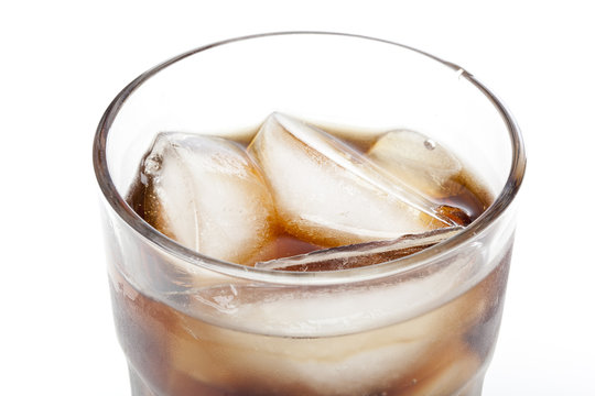 Brown soda in a clear glass