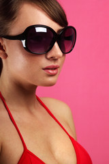 Young woman wearing sunglasses