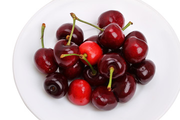Cherries on a white plate