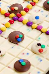 still life of white chocolate with smarties