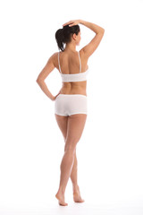Fototapeta premium Back of beautiful woman with toned fit body