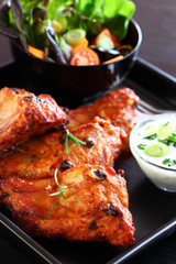 Spare ribs with vegetable salad