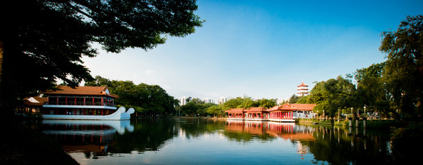 Fototapeta na wymiar Chinese pavilion and pagoda on the lake
