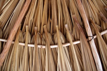 Palm tree leaves in sunroof palapa hut roofing