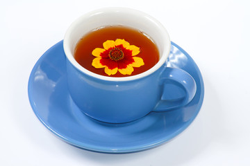 The cup of tea with nice flowers