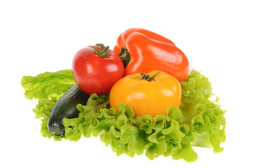green salad and tomato isolated on the white background