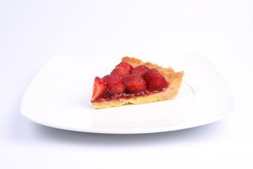 Strawberry Tart portion on a white background