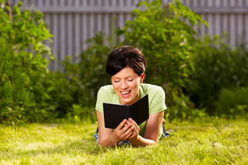 reading e-book in the park