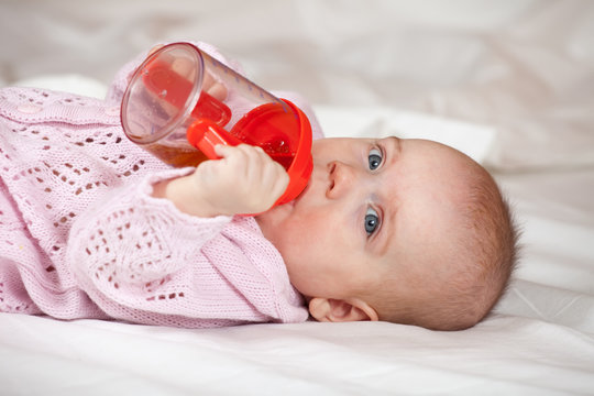 Baby Girl  With Sippy Cup