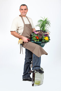 Smiling Gardener On White Background