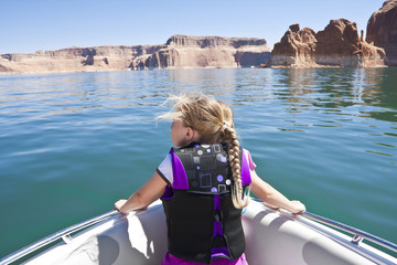 Little Girl on a boat ride at Lake Powell, Utah - Powered by Adobe