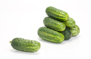 One and a few green cucumbers