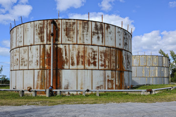 Old rusty oil tanks in Governor's Harbour