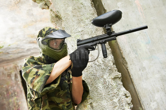 paintball player under cover