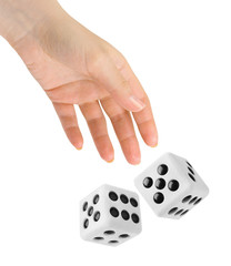Hand throwing two dices