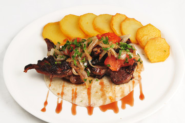 The fried meat with a potato