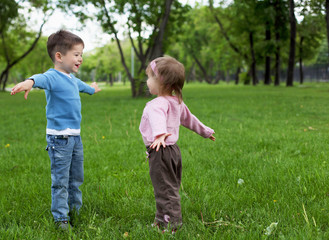 Fototapeta premium happy sister and brother outdoors
