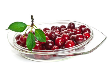 cherries on a glass dish