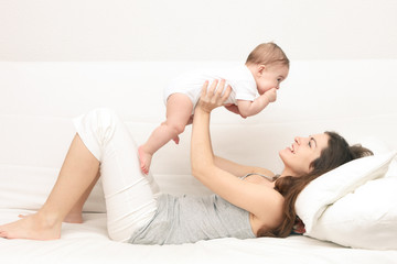 Fototapeta na wymiar Mother with baby