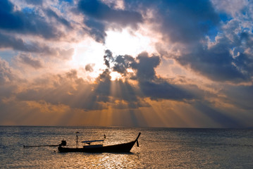 Fototapeta na wymiar Fish boat at sunrise
