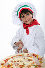 A young pizza maker