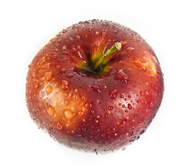 red apple with drops of dew