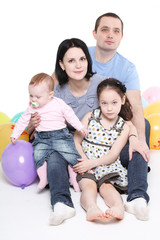 Fototapeta na wymiar Happy family with two children