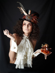 Portrait of a woman in a hat with feathers