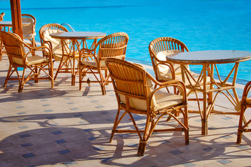 Table and chairs by the pool
