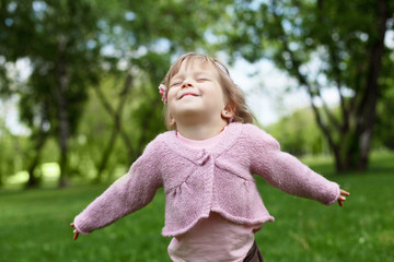 Portrait of a little girl outdoors