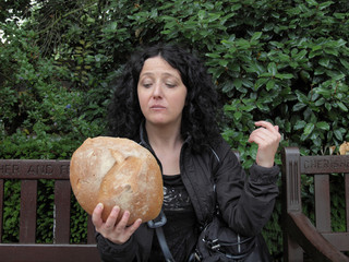Girl with bread in Hamlet pose