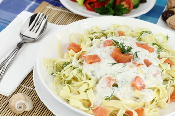 Tagliatelle pasta with cream, salmon and anise