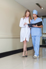 Doctor and nurse with file