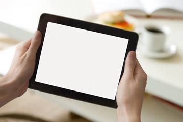 Digital tablet in living room (with screen clipping path)