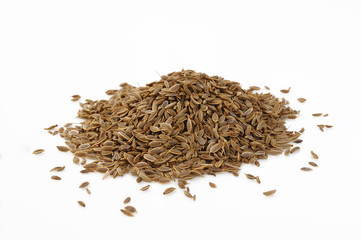 pile dill seeds on white background