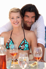 couple relaxing in a beach restaurant