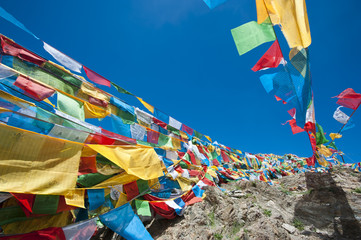 Buddhist prayer flags with blue sky