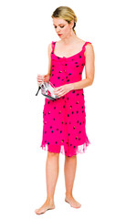 Mid adult woman holding high heels