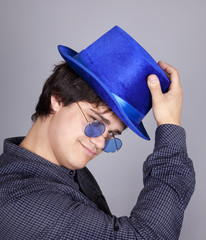 Secret men with blue hat and blasses.