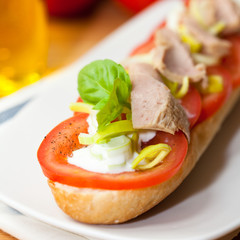Baguette with tomato and tuna