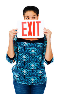 Fashion model holding exit sign