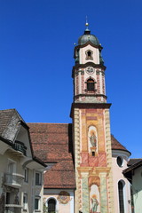 Fototapeta na wymiar church tower of Mittenwald at Bavarian Alps, Germany